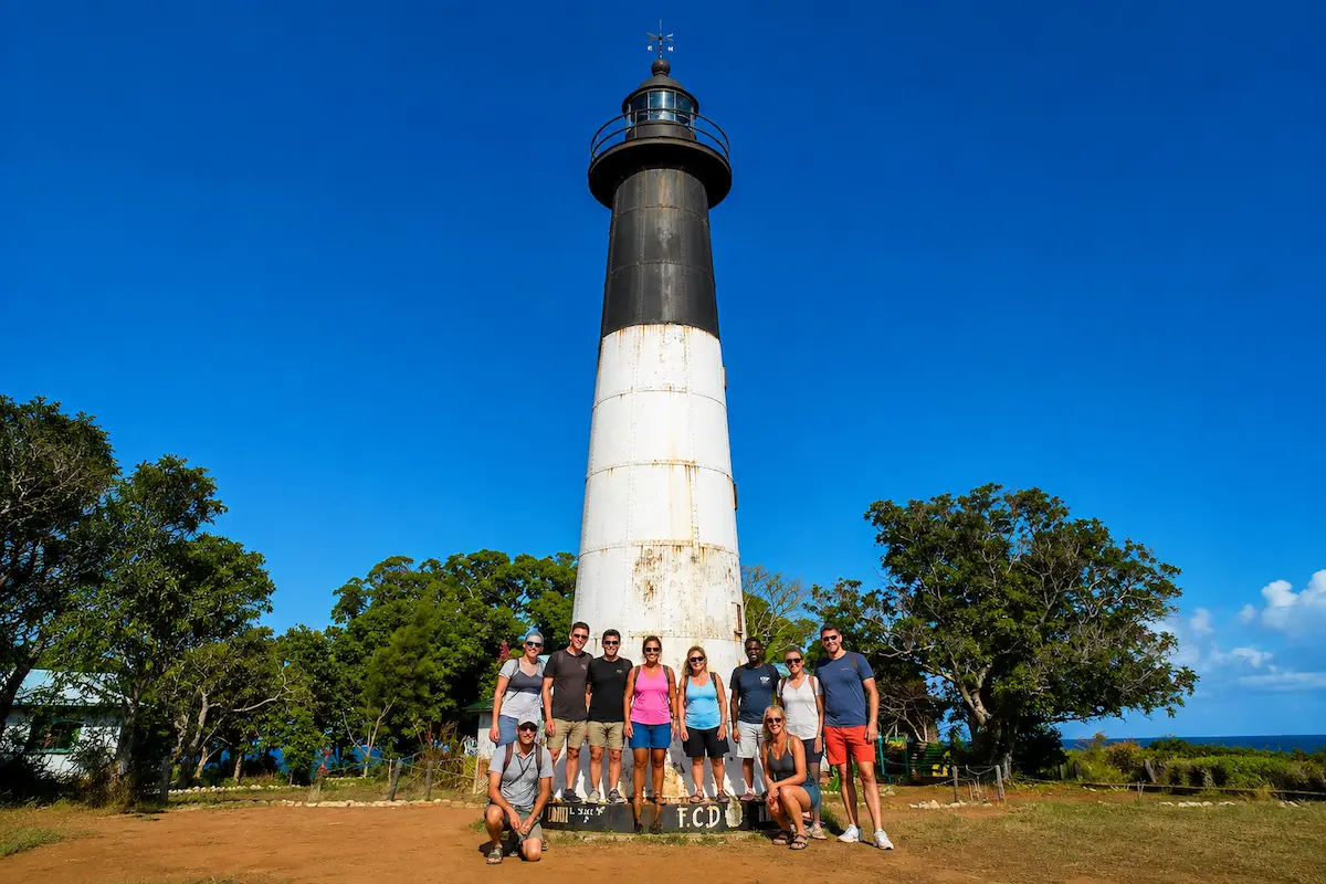 Tourists taking photo at Nosy Iranja lighthouse in Madagascar