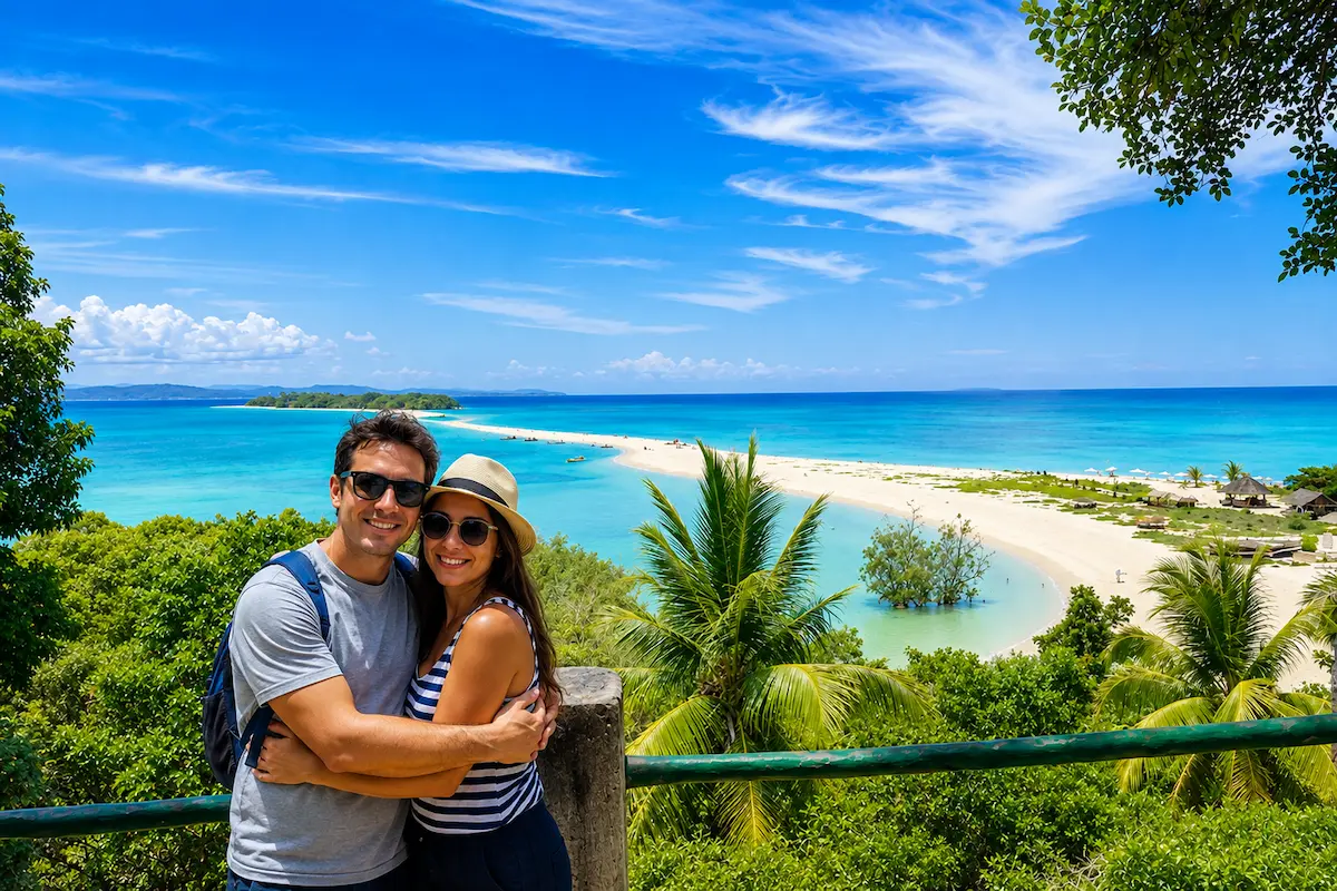 Couple taking photo at Nosy Iranja viewpoint from Nosy Be Madagascar