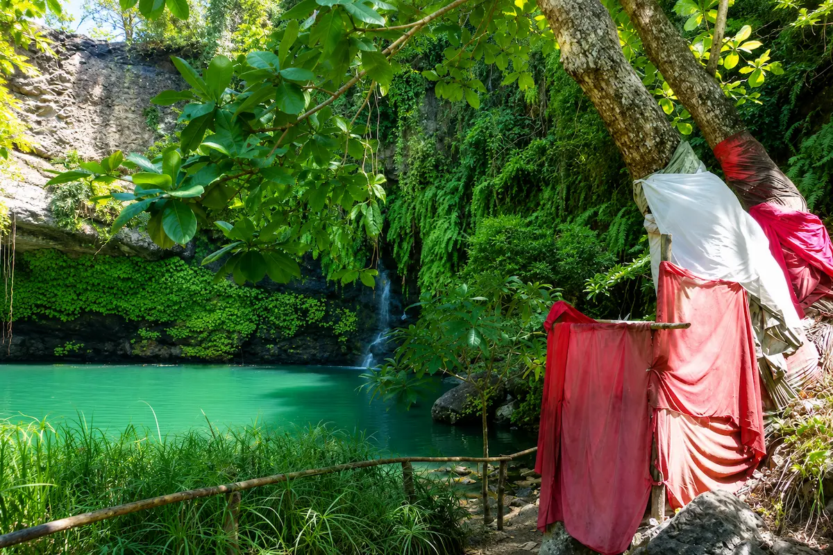 Sacred waterfall with natural swimming pool in Nosy Be Madagascar
