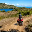 ATV riding along Nosy Be coastal landscape in Madagascar