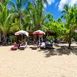 Relaxing on beachfront loungers at Nosy Sakatia Madagascar