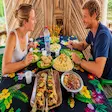 Traditional Malagasy lunch with tourists on Nosy Komba island Madagascar