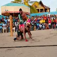 Moraingy fighter dodging attack during Madagascar traditional boxing
