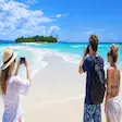 Tourists Taking Photos on Nosy Iranja Sandbank near Nosy Be