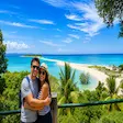 Couple taking photo at Nosy Iranja viewpoint from Nosy Be Madagascar