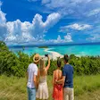 Tourists taking photo at Nosy Iranja viewpoint in Madagascar