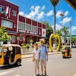 Tourists walking past Nosy Be town hall in Hell-Ville Madagascar