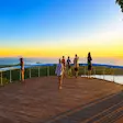 Tourists watching the sunset at Mont Passot, Nosy Be, Madagascar