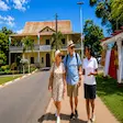 Tourists with local guide at Nosy Be history museum in Madagascar