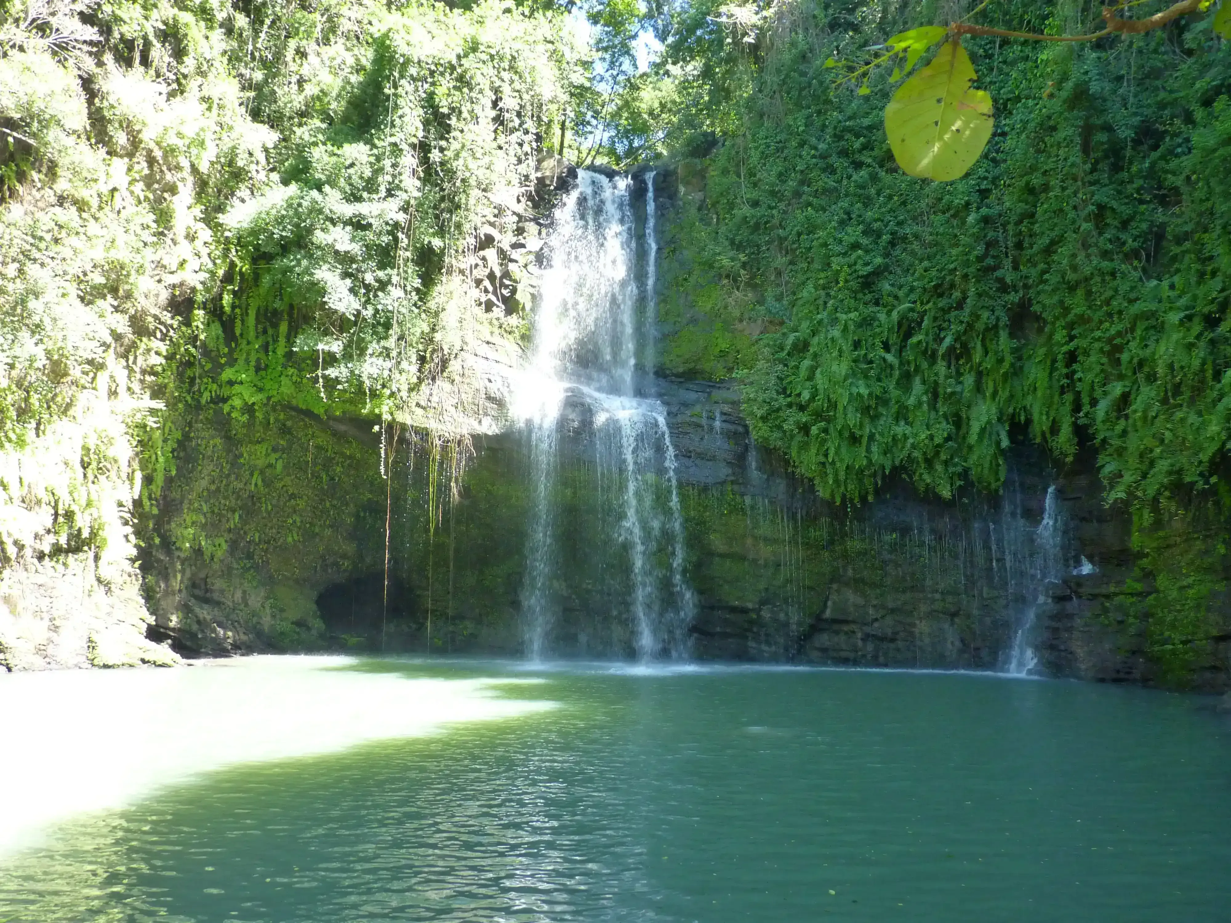 Iconic sacred waterfall of Nosy Be Madagascar surrounded by greenery